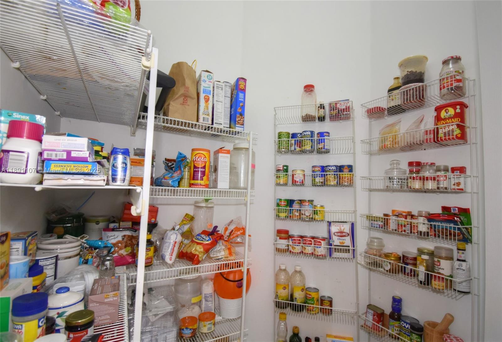 4240 Southwest 131st Avenue Davie, FL 33330 - Photo 46 of 47 a store room with lots of clutter and cars