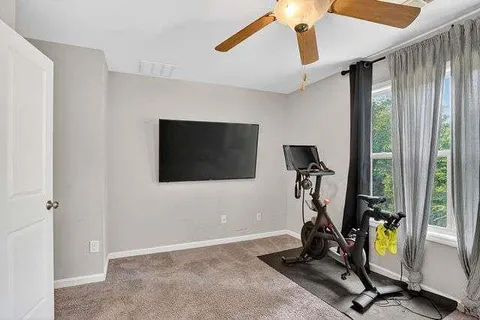 a view of a room with gym equipment