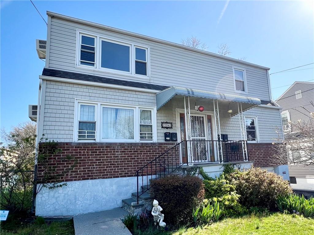 a view of a house with a garden