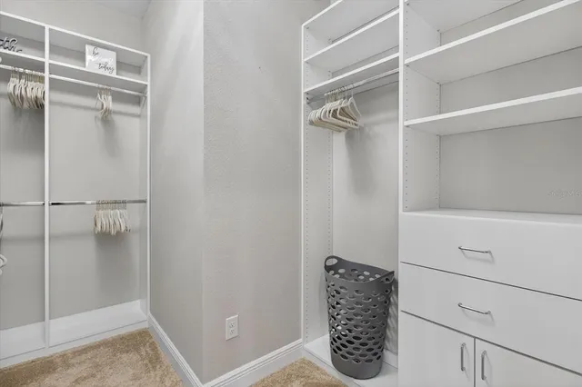 a view of a bedroom from a hallway