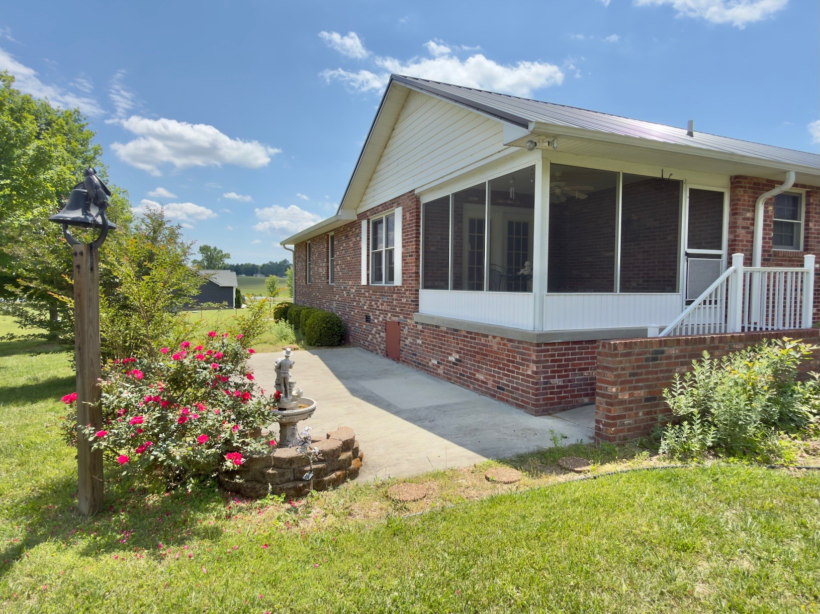 4929 Fountain Grove Road Morrison, TN 37357 - Photo 11 of 33 a front view of a house with a garden