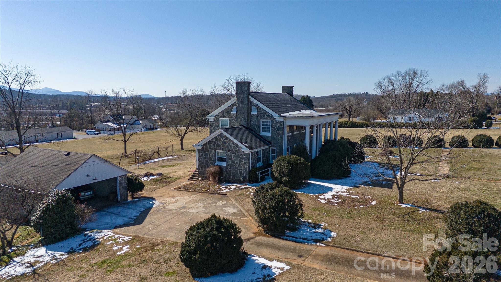 615 Carbon City Road Morganton, NC 28655 - Photo 4 of 42 a view of a house with a yard and sitting area