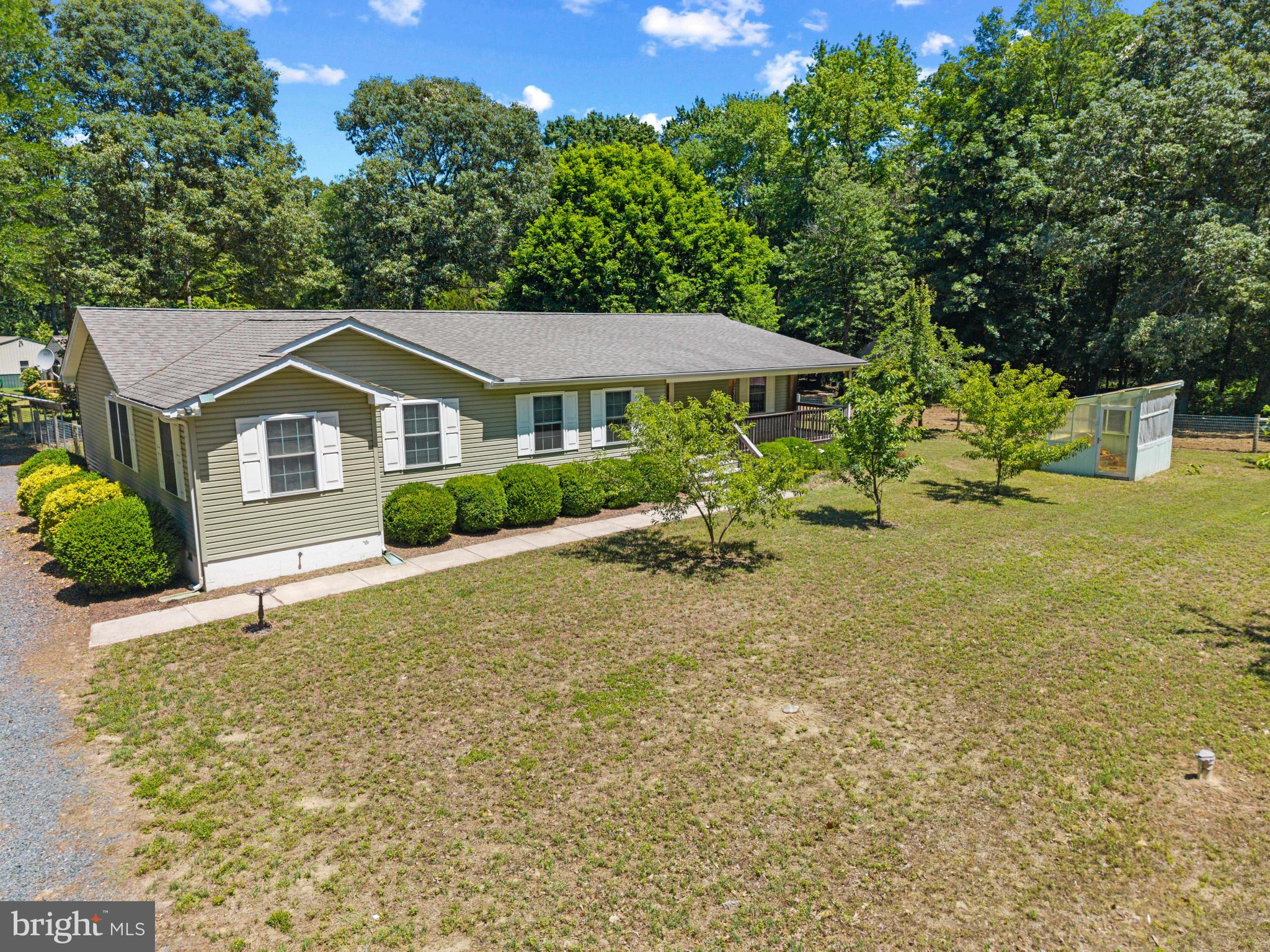23116 Gilpin Point Road Preston, MD 21655 - Photo 46 of 66 Inviting rancher nestled around mature trees.