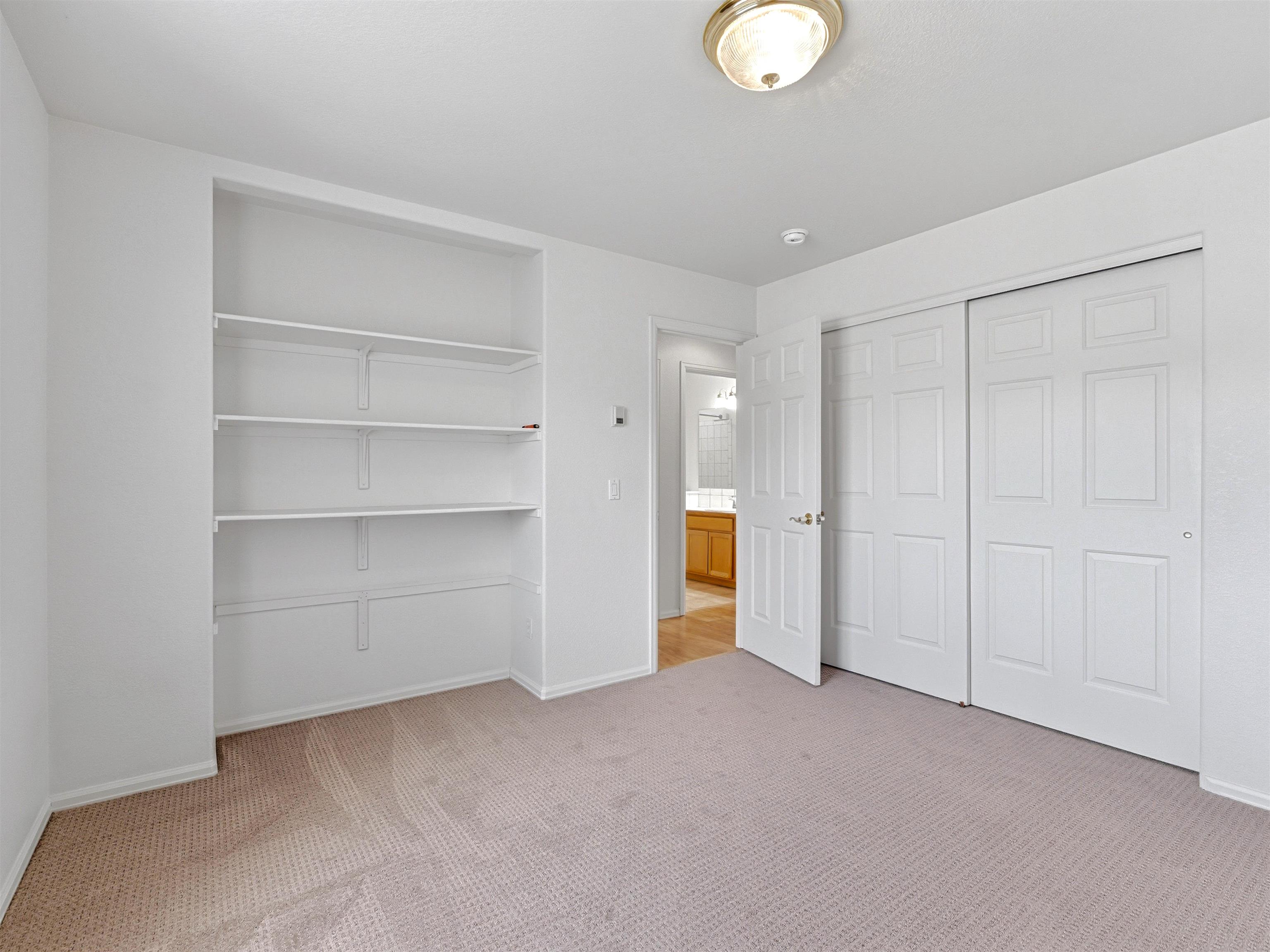 3082 Shadowbrook Court Grand Junction, CO 81504 - Photo 18 of 28 a view of an empty room with a cabinet