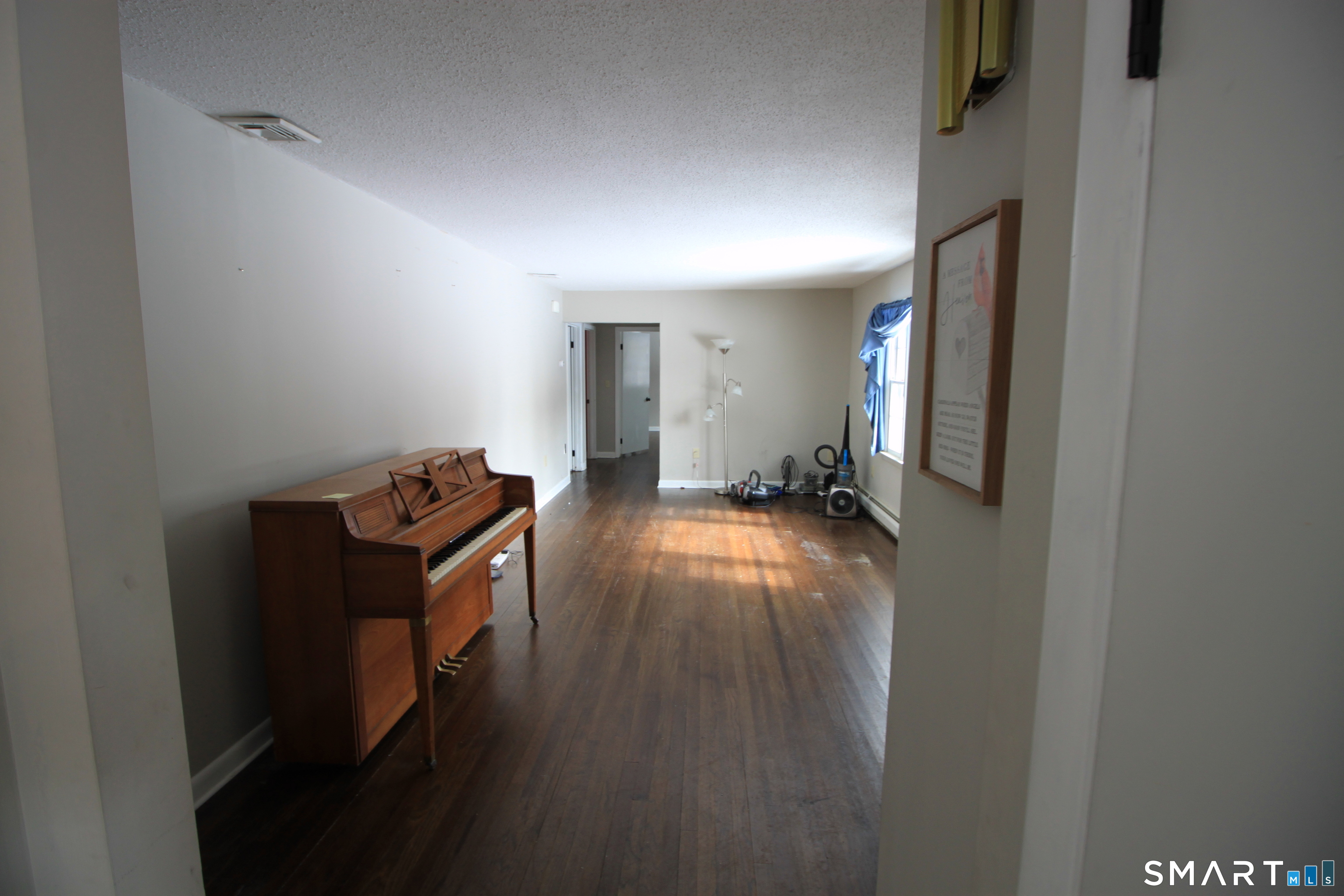 11 Old Fairwood Road Bethany, CT 06524 - Photo 11 of 20 a view of room with wooden floor