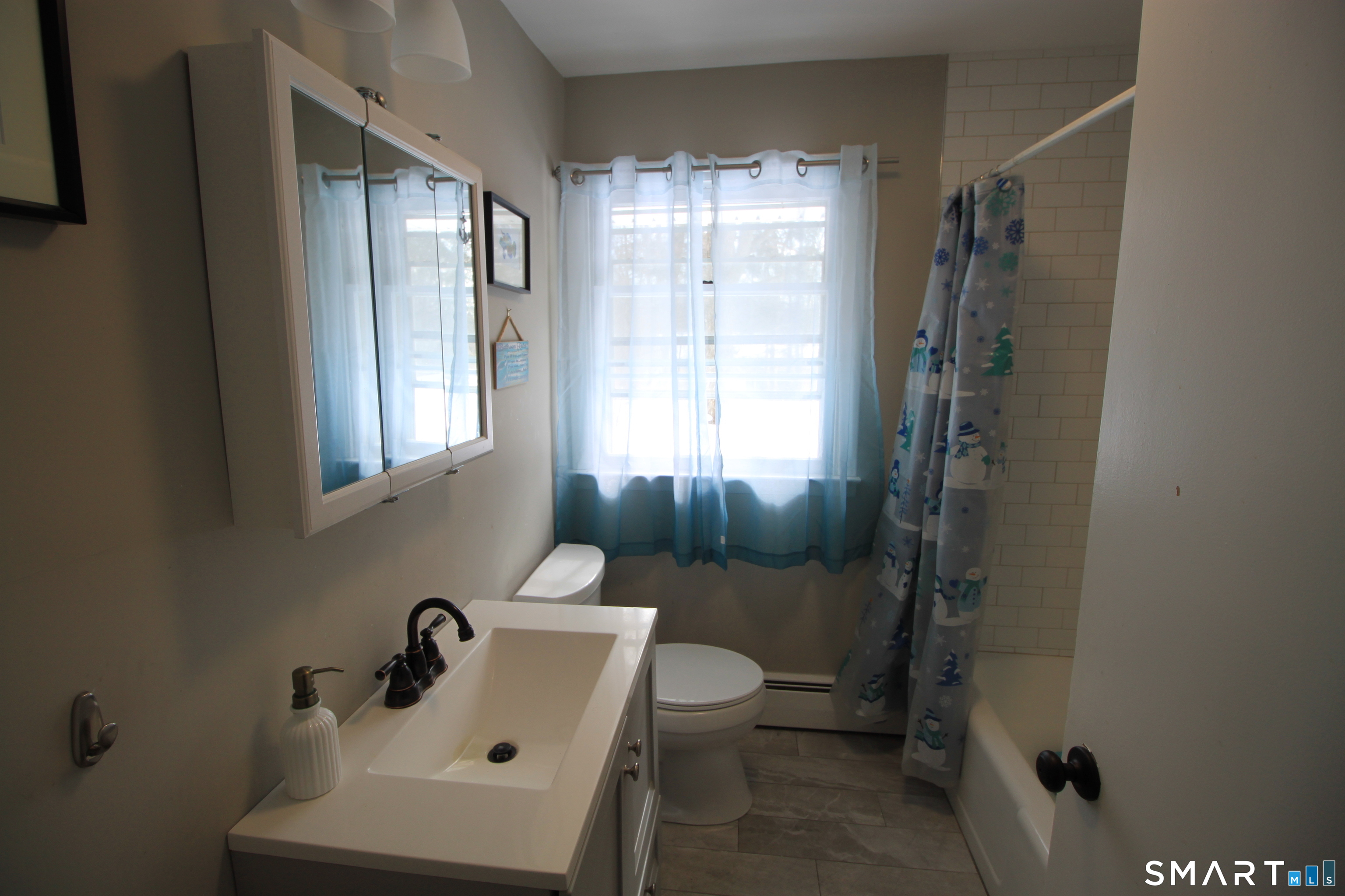 11 Old Fairwood Road Bethany, CT 06524 - Photo 18 of 20 a bathroom with a sink toilet and shower