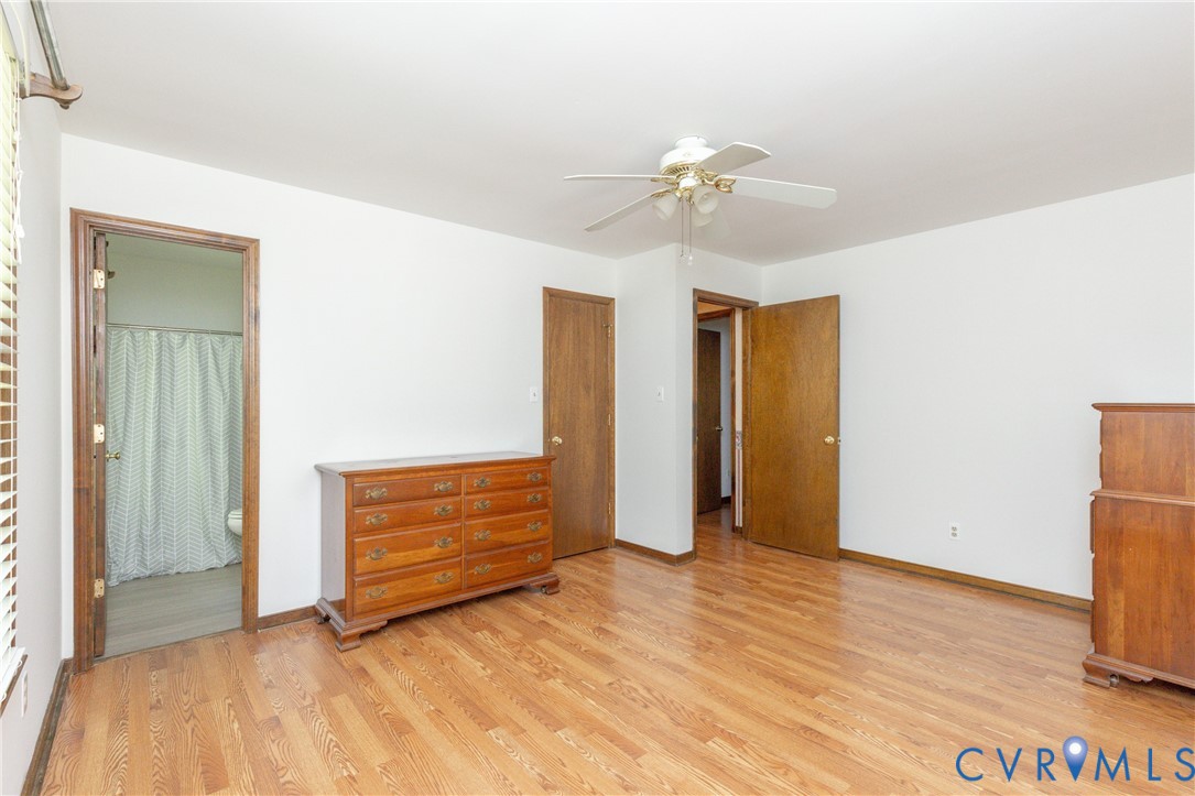 617 Rebel Ridge Road Colonial Heights, VA 23834 - Photo 34 of 49 a view of room with wooden floor and ceiling fan