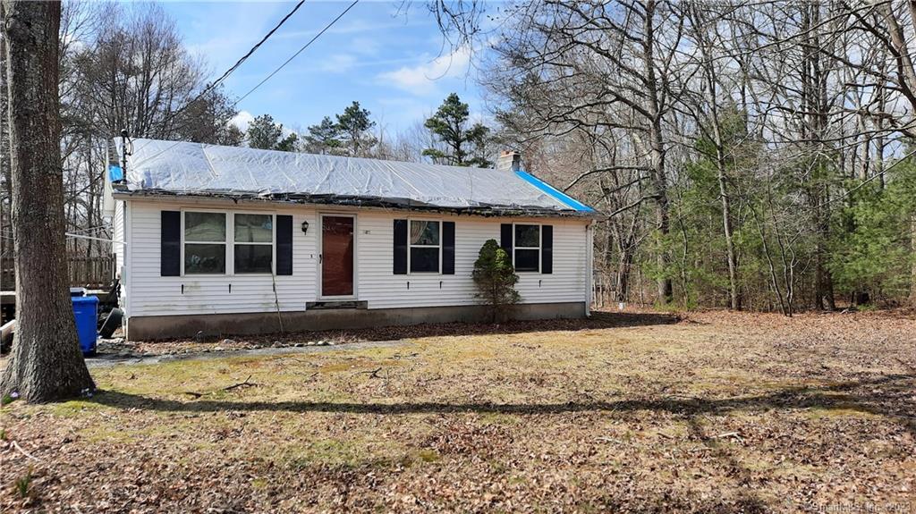 427 Bailey Hill Road Killingly, CT 06239 - Photo 1 of 1 a view of a house with a yard covered in snow