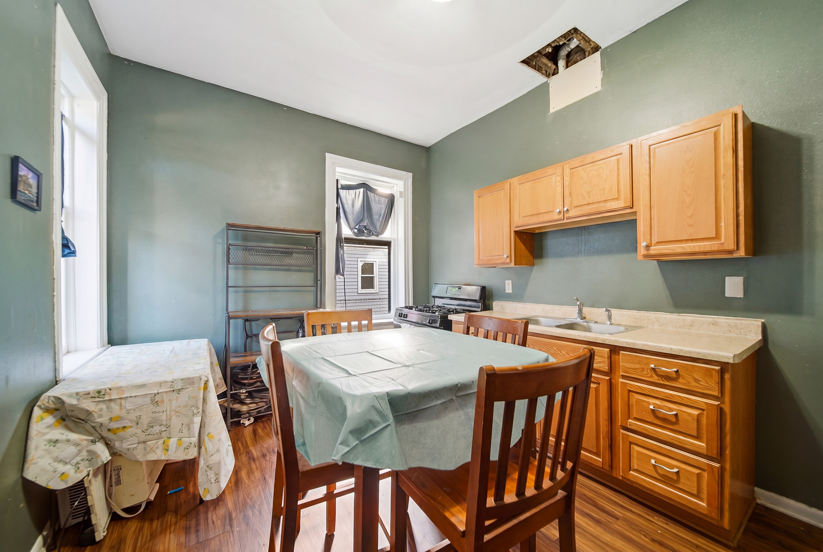 305 Monroe Avenue Dixon, IL 61021 - Photo 14 of 36 a view of a dining room with furniture and window