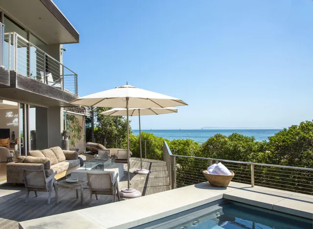 an outdoor space with patio the couch and chairs