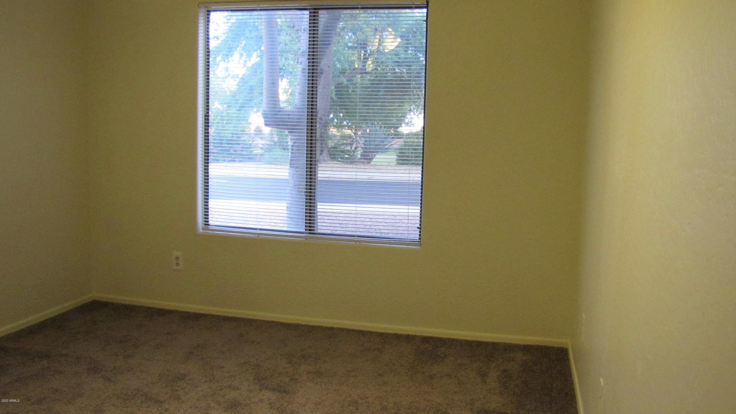 16086 West Calavar Road Surprise, AZ 85379 - Photo 14 of 28 a view of a small space with a window