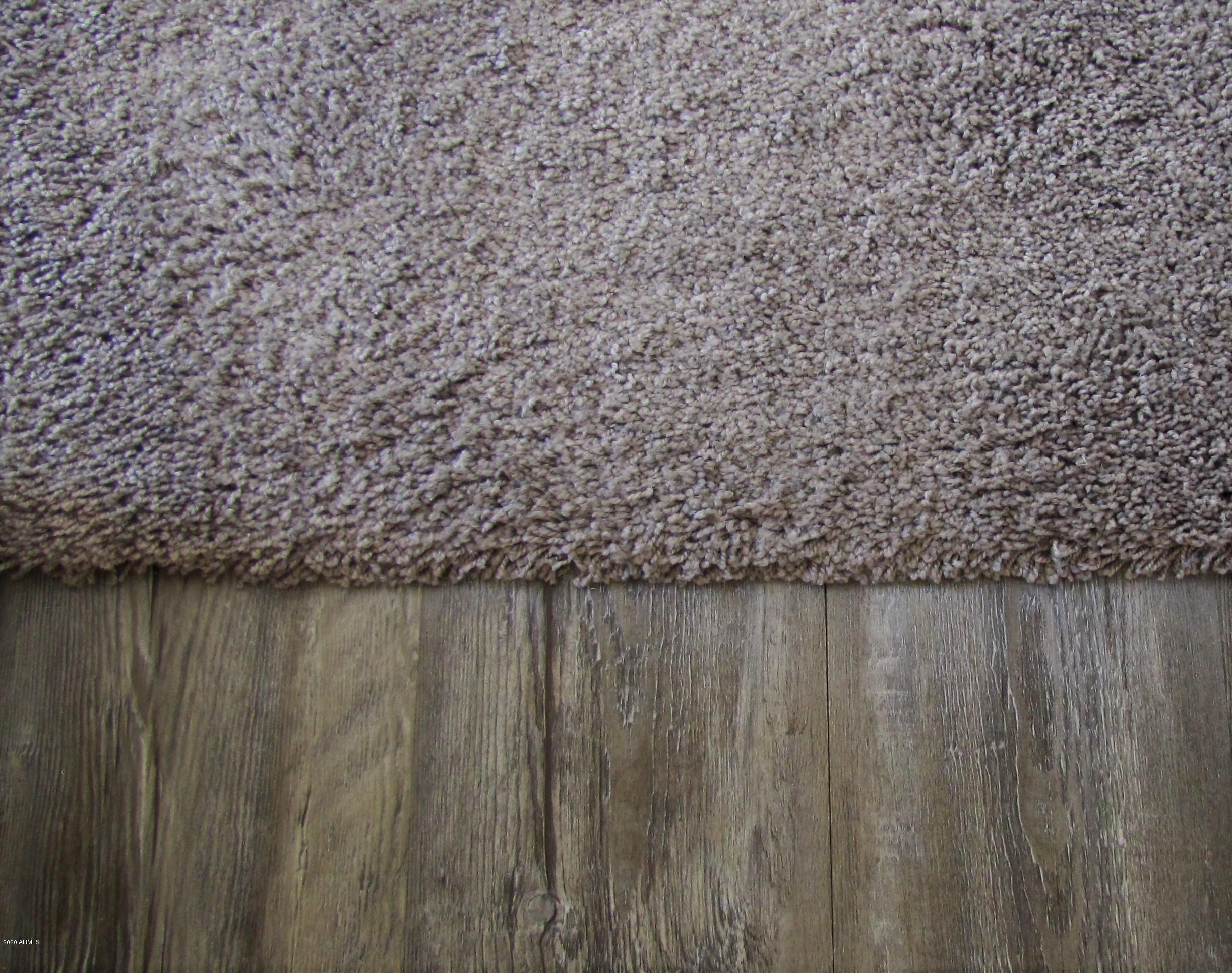 16086 West Calavar Road Surprise, AZ 85379 - Photo 17 of 28 a close view of wooden floor