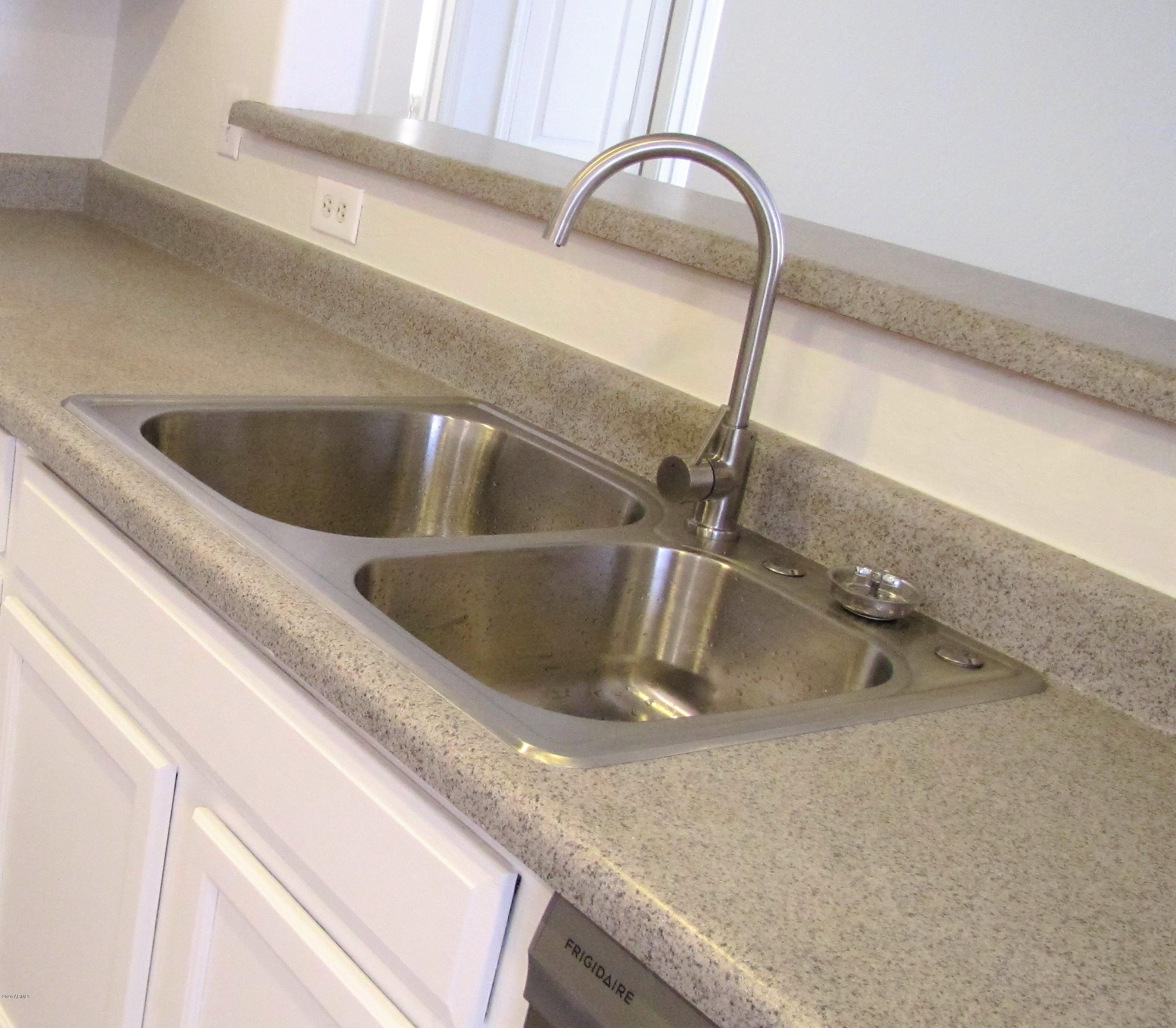 16086 West Calavar Road Surprise, AZ 85379 - Photo 8 of 28 a close view of sink and tap