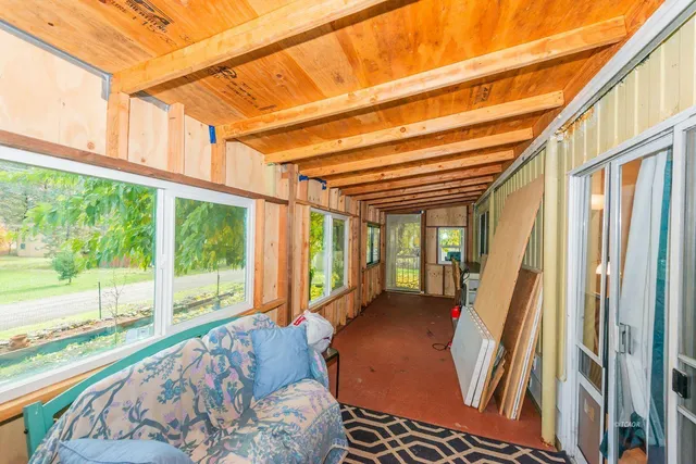 a room with furniture and a window