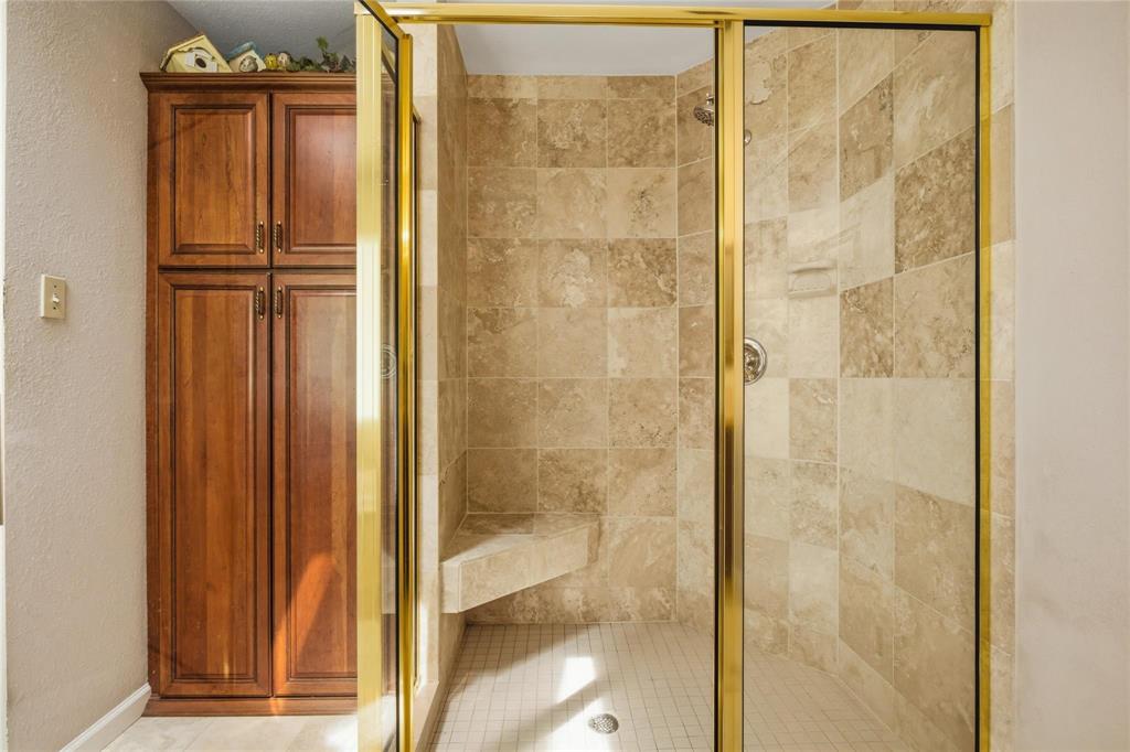 265 East Dove Road Southlake, TX 76092 - Photo 21 of 39 a bathroom with a shower