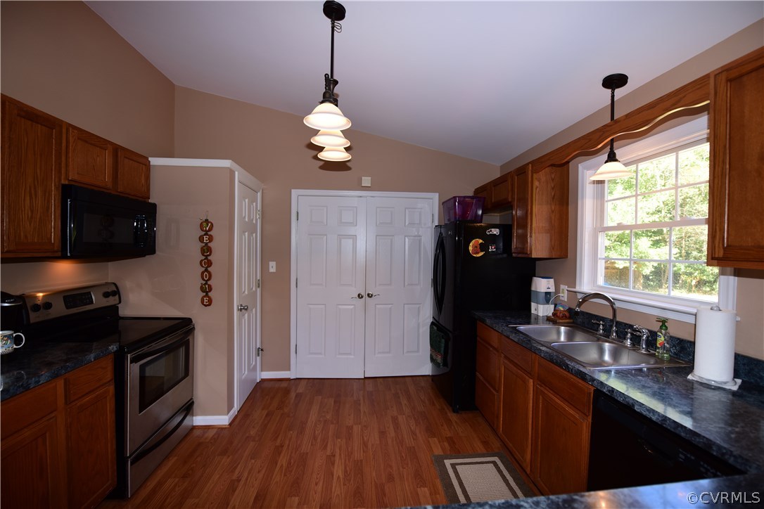 20820 Beaver Dam Road Beaverdam, VA 23015 - Photo 13 of 26 a kitchen with granite countertop stainless steel appliances a counter space cabinets and a window