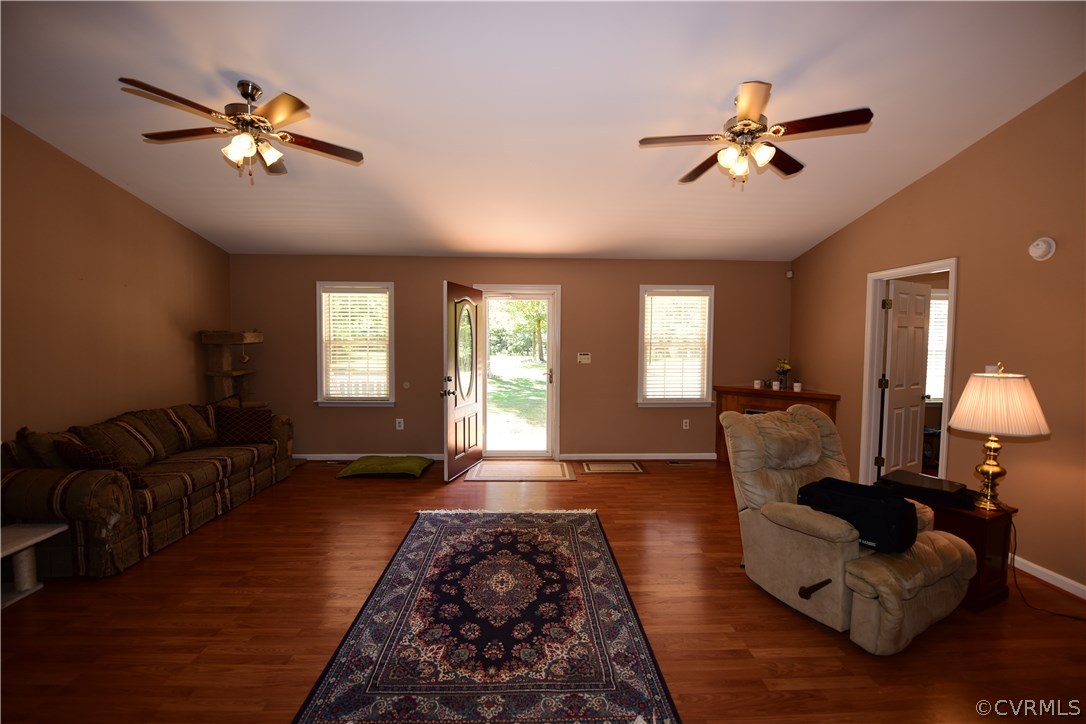 20820 Beaver Dam Road Beaverdam, VA 23015 - Photo 6 of 26 a living room with furniture and a chandelier