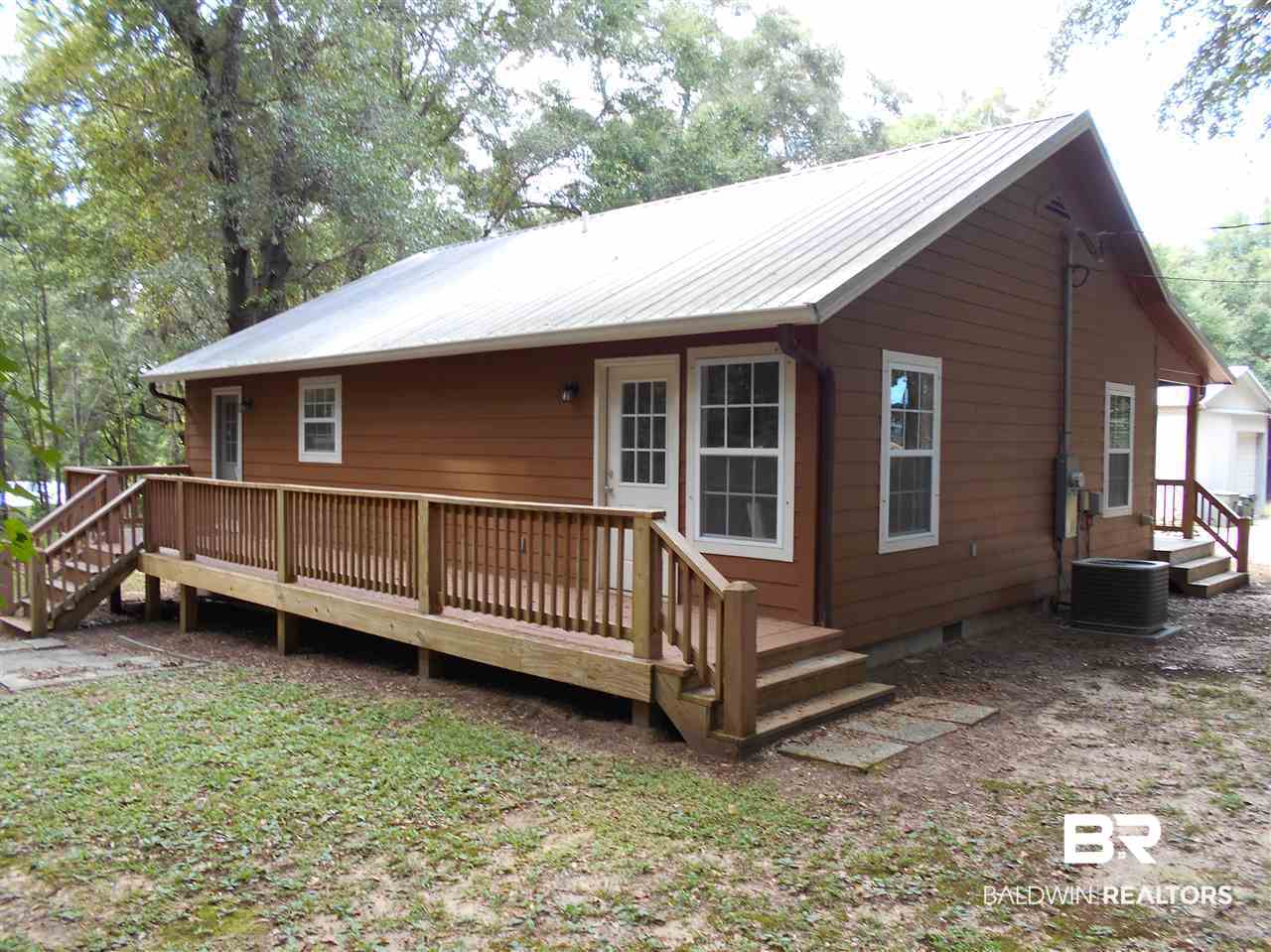 13408 Pendix Road Summerdale, AL 36580 - Photo 3 of 31 Big rear porch.