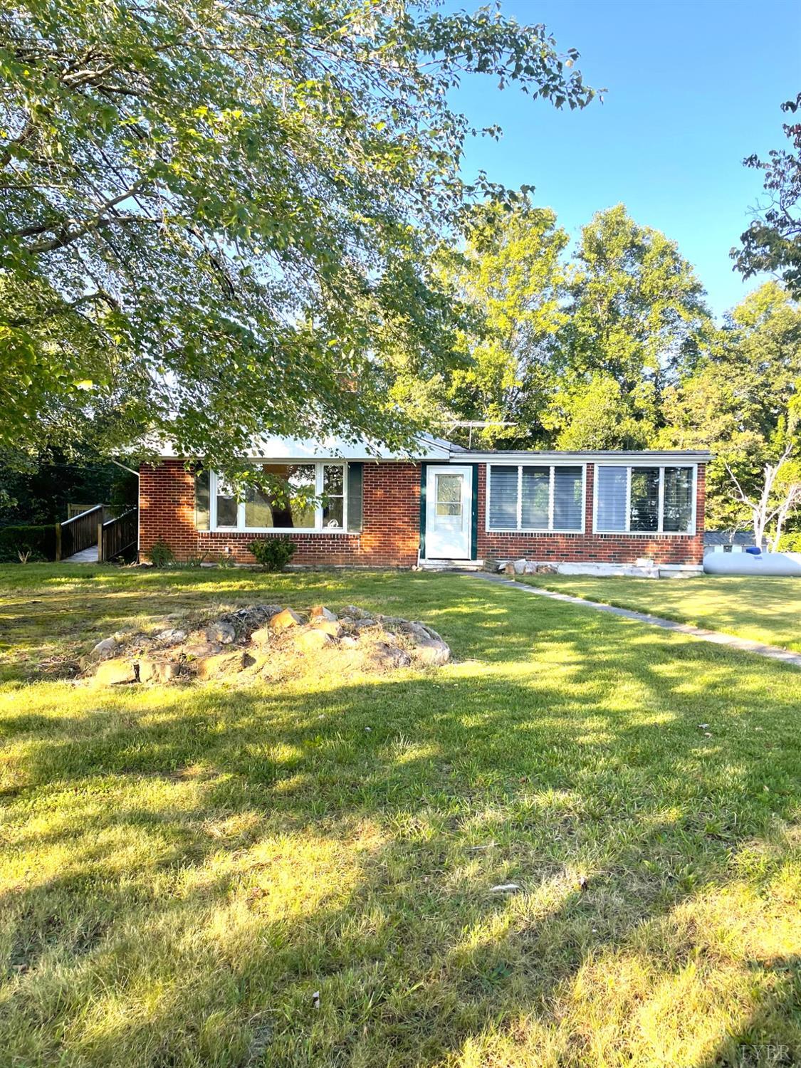 6181 Renan Road Hurt, VA 24563 - Photo 2 of 35 a view of a house with a swimming pool