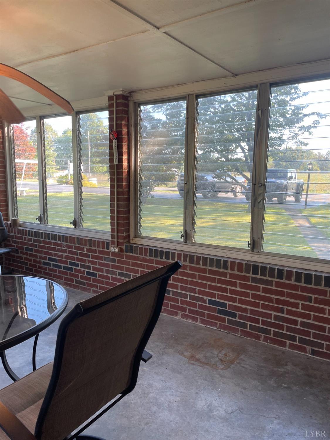 6181 Renan Road Hurt, VA 24563 - Photo 29 of 35 a view of a patio with a table and chairs
