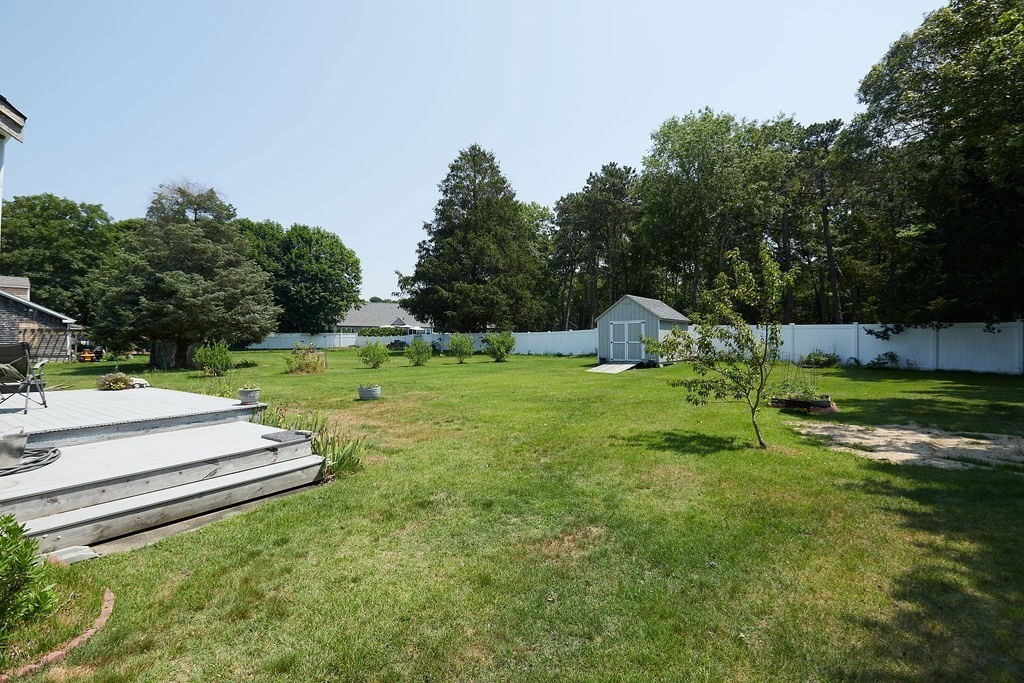 738 Sandwich Road Bourne, MA 02532 - Photo 21 of 25 a garden view with a seating space