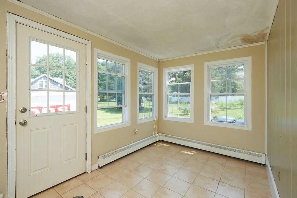 738 Sandwich Road Bourne, MA 02532 - Photo 9 of 25 an empty room with windows
