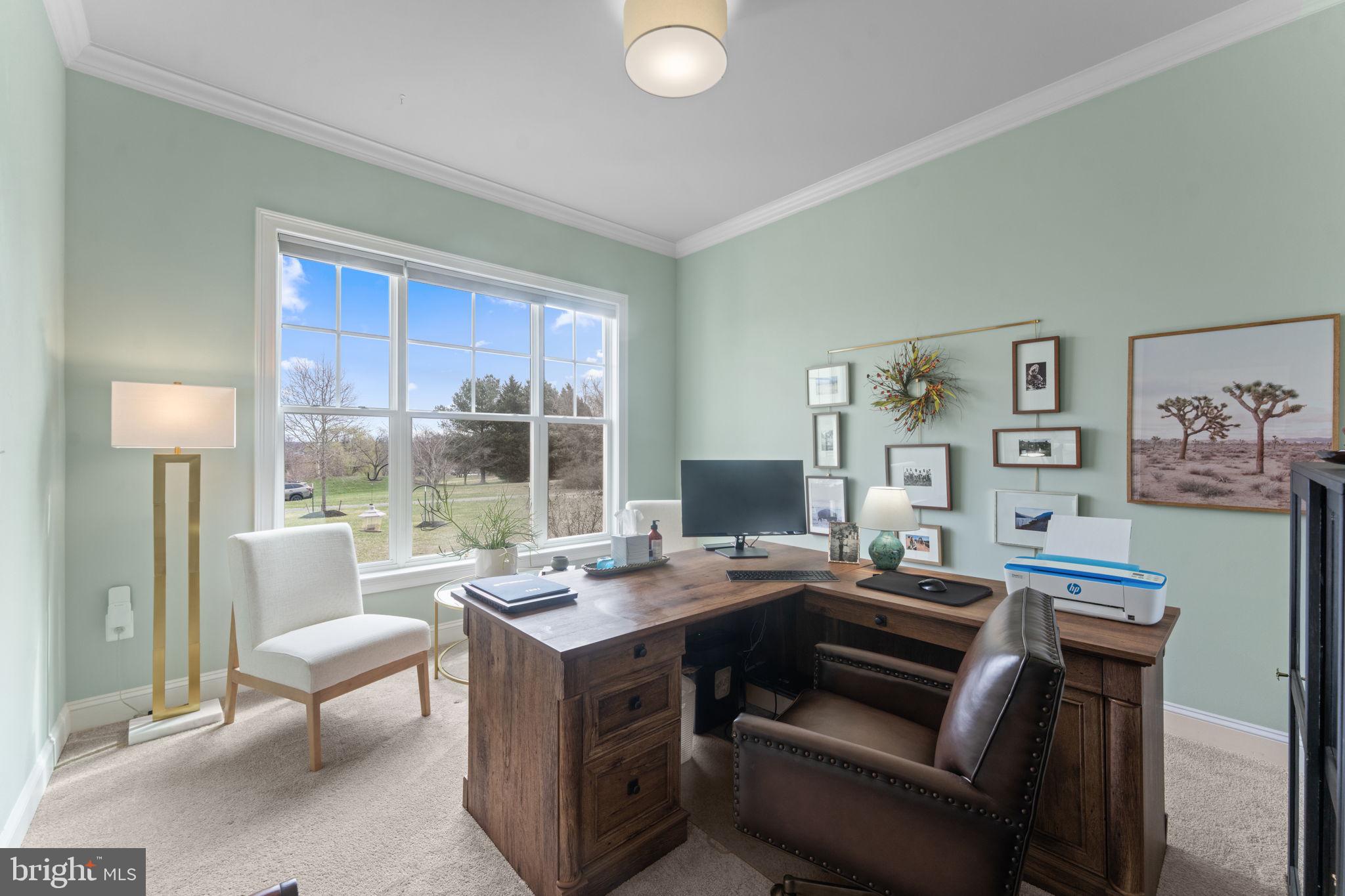 16756 Misty Ridge Lane Purcellville, VA 20132 - Photo 12 of 92 a living room with furniture and a large window