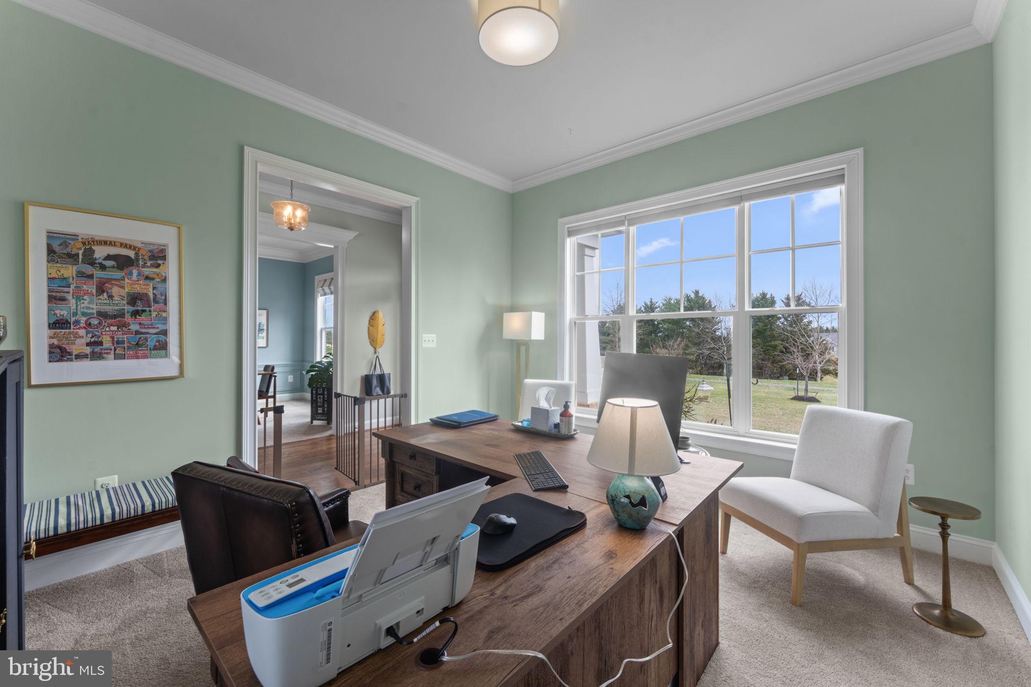 16756 Misty Ridge Lane Purcellville, VA 20132 - Photo 13 of 92 a living room with furniture and floor to ceiling windows