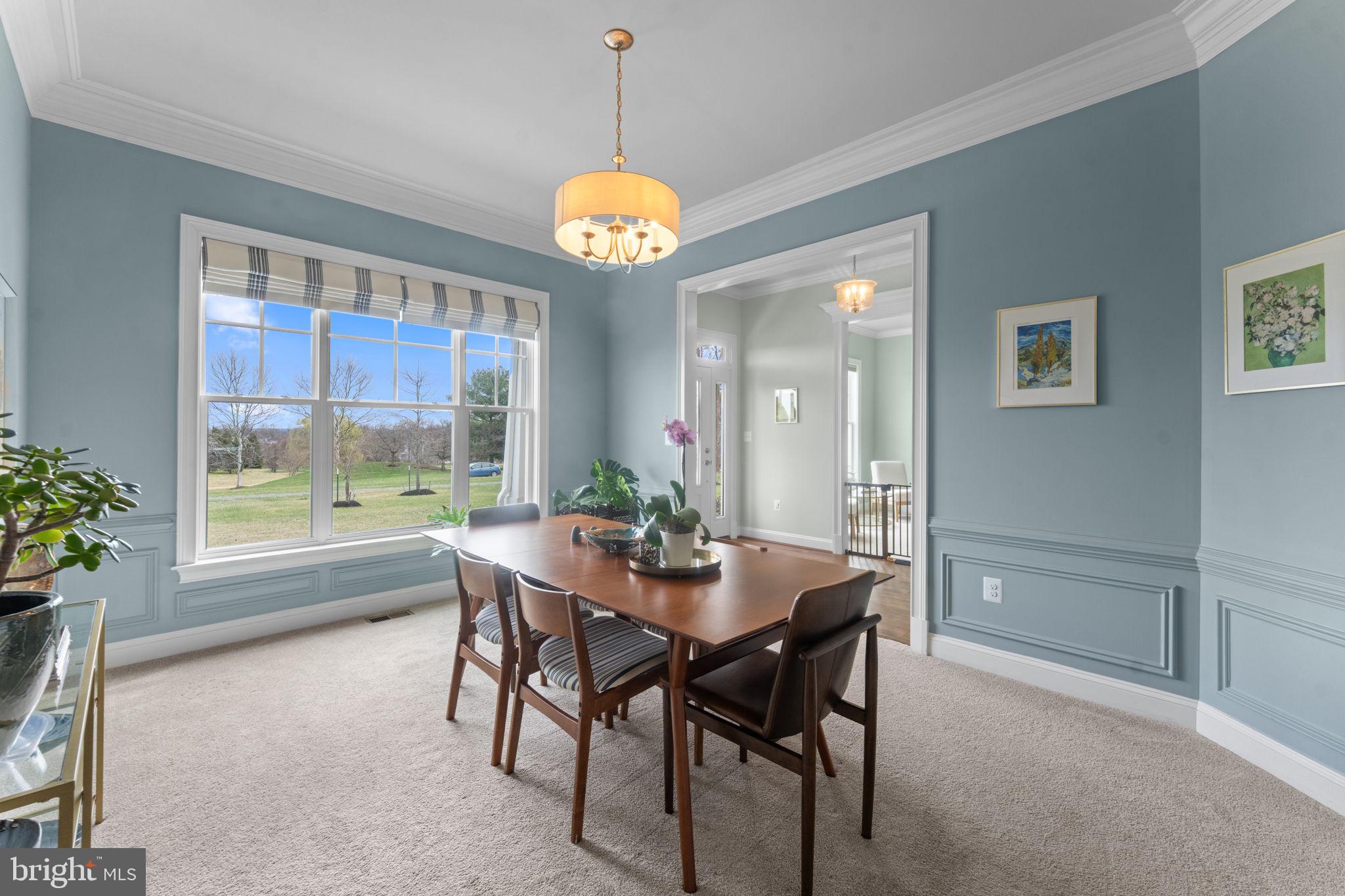 16756 Misty Ridge Lane Purcellville, VA 20132 - Photo 15 of 92 a view of a dining room with furniture window and outside view