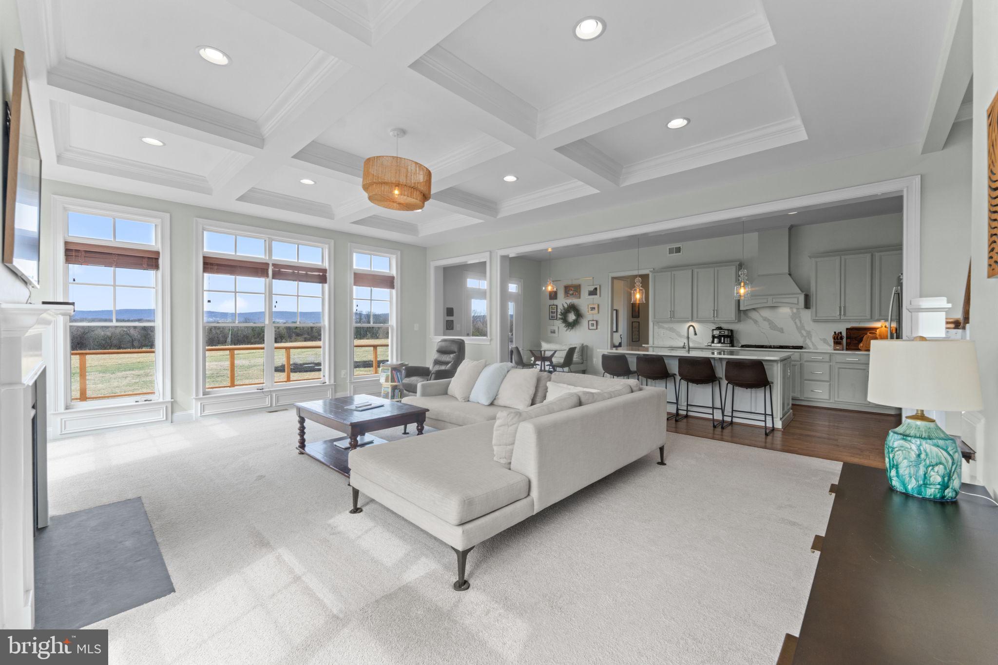 16756 Misty Ridge Lane Purcellville, VA 20132 - Photo 21 of 92 a living room with furniture and a large window