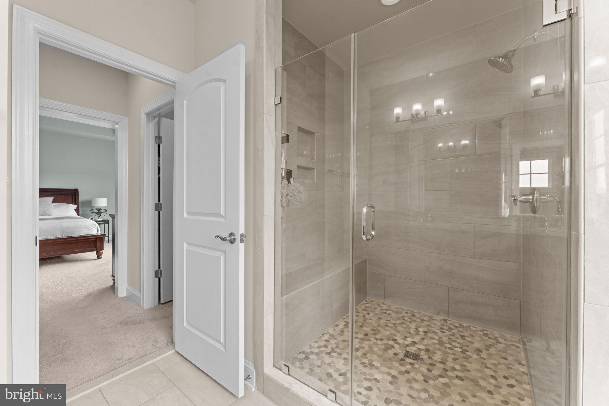 16756 Misty Ridge Lane Purcellville, VA 20132 - Photo 47 of 92 a bathroom with a shower and a sink