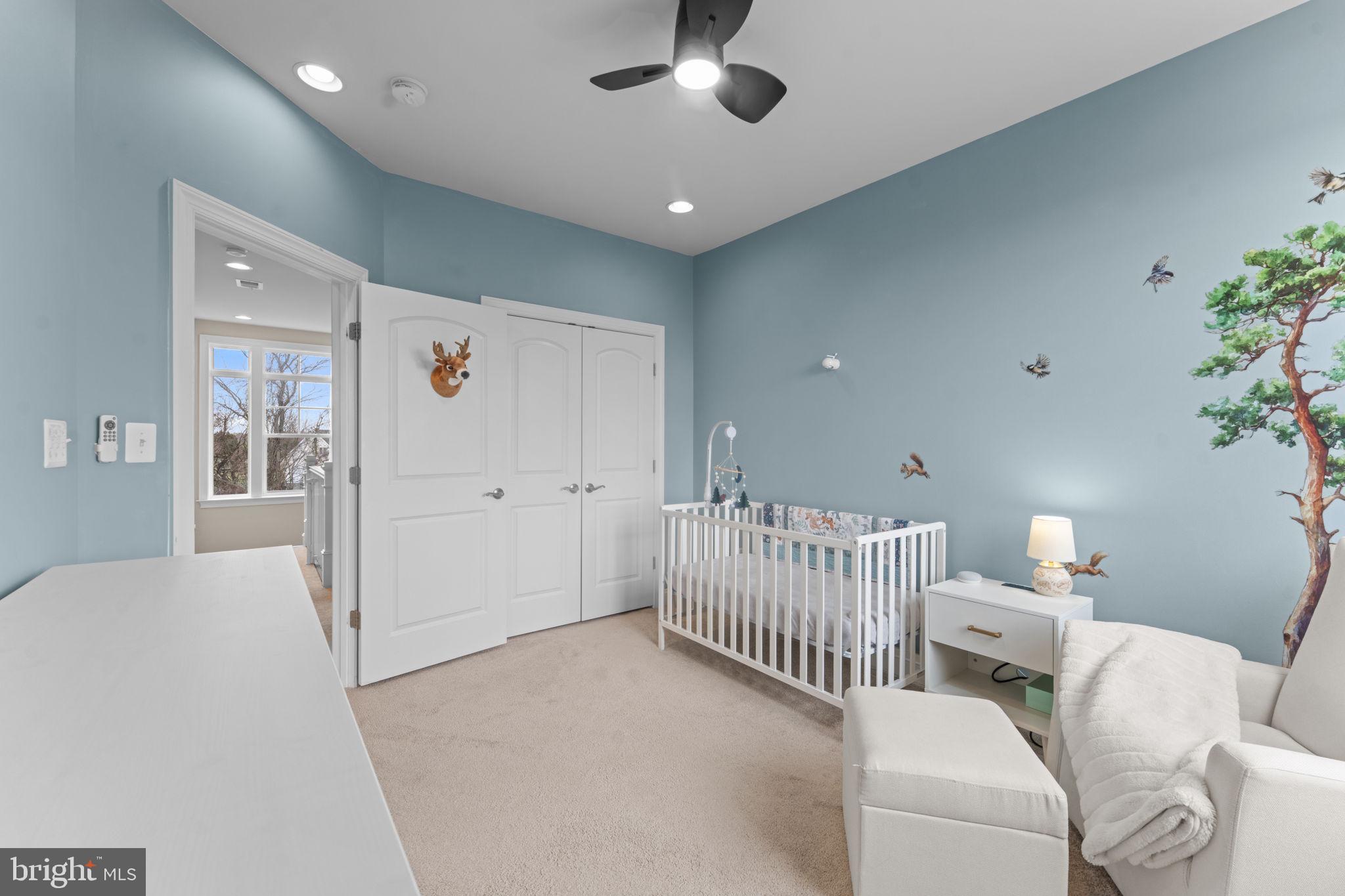 16756 Misty Ridge Lane Purcellville, VA 20132 - Photo 58 of 92 a bedroom with furniture and white walls