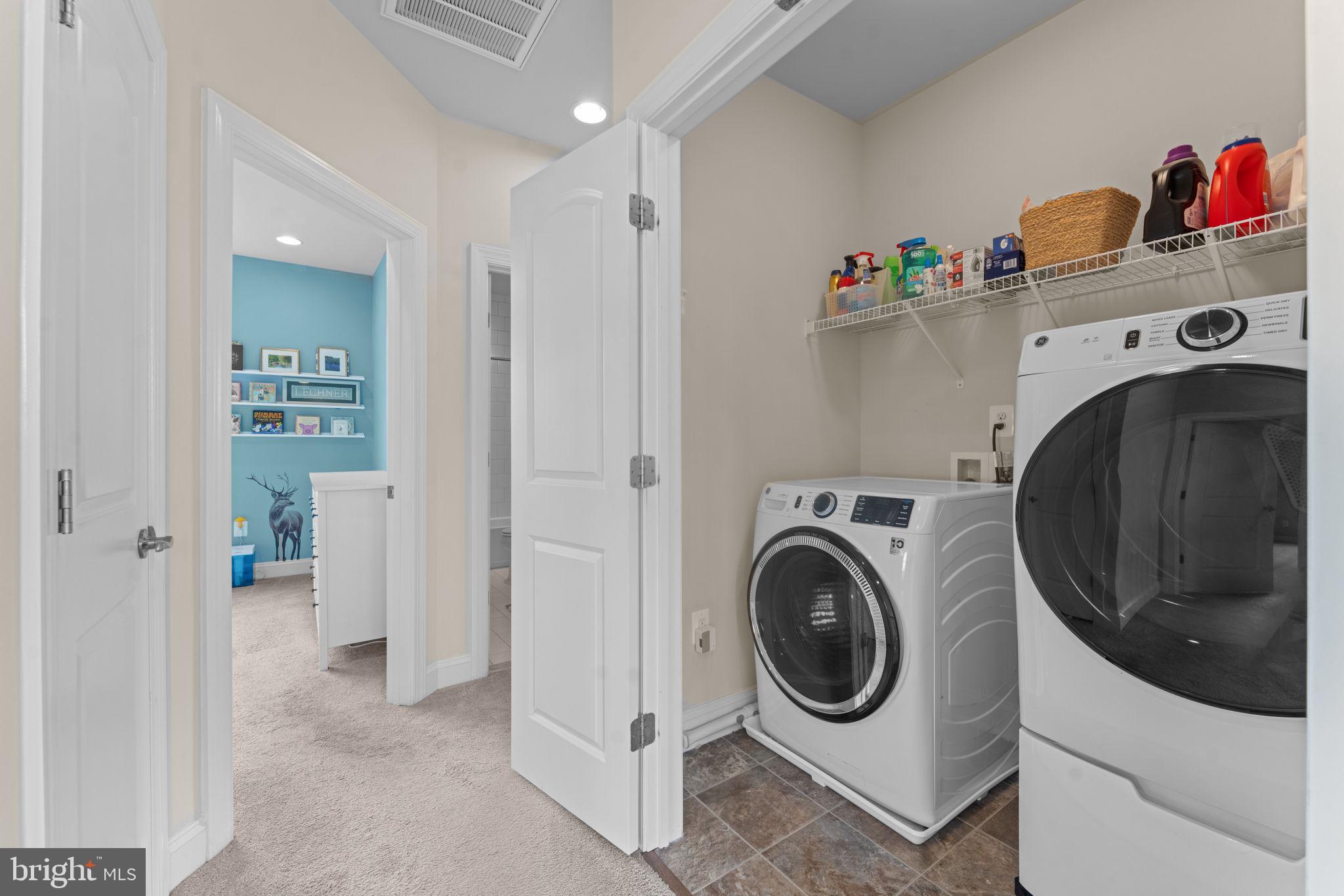 16756 Misty Ridge Lane Purcellville, VA 20132 - Photo 64 of 92 a utility room with dryer and washer