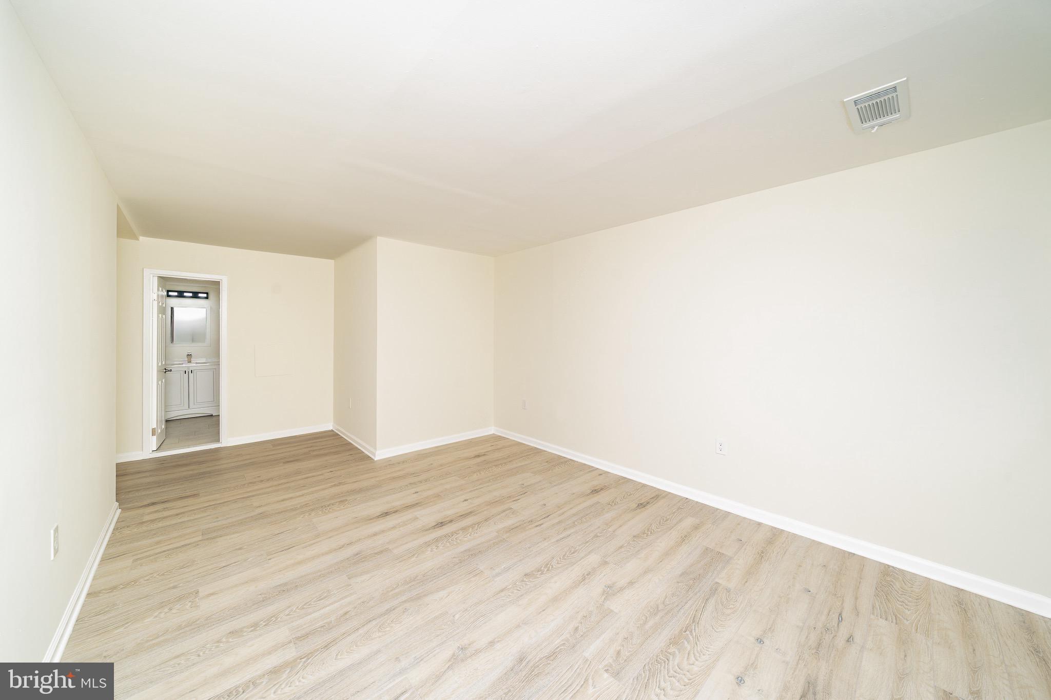 9910 Walker House Road, Unit 99104 Gaithersburg, MD 20886 - Photo 18 of 32 a view of empty room