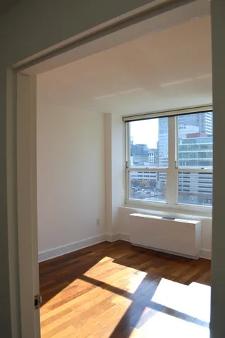 a view of an empty room and window
