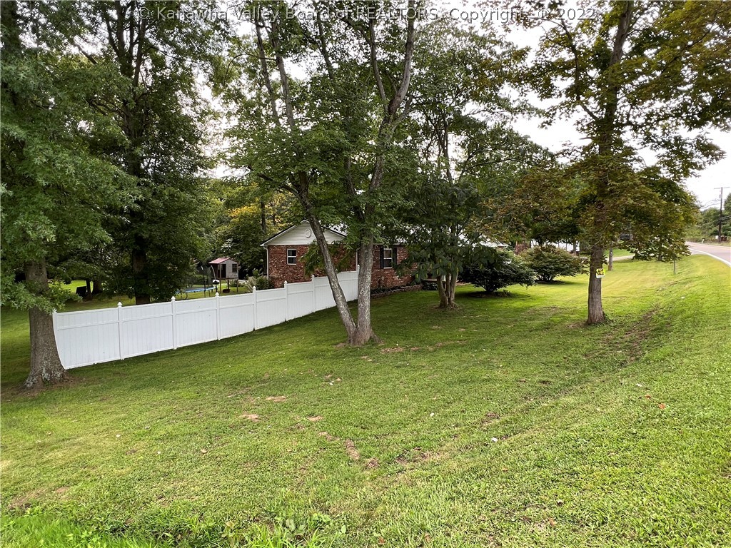 6490 Jericho Road Point Pleasant, WV 25550 - Photo 19 of 27 front yard with privacy fence