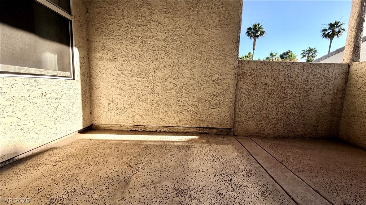 6250 West Flamingo Road, Unit 4 Las Vegas, NV 89103 - Photo 26 of 45 This inviting patio area offers a private retreat with ample outdoor space and desert views.