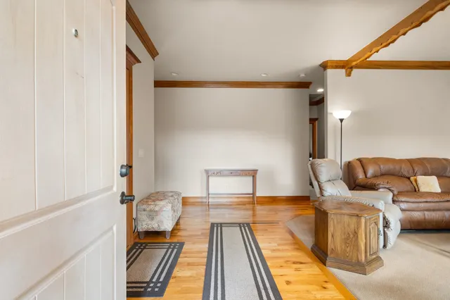 a living room with furniture and a rug
