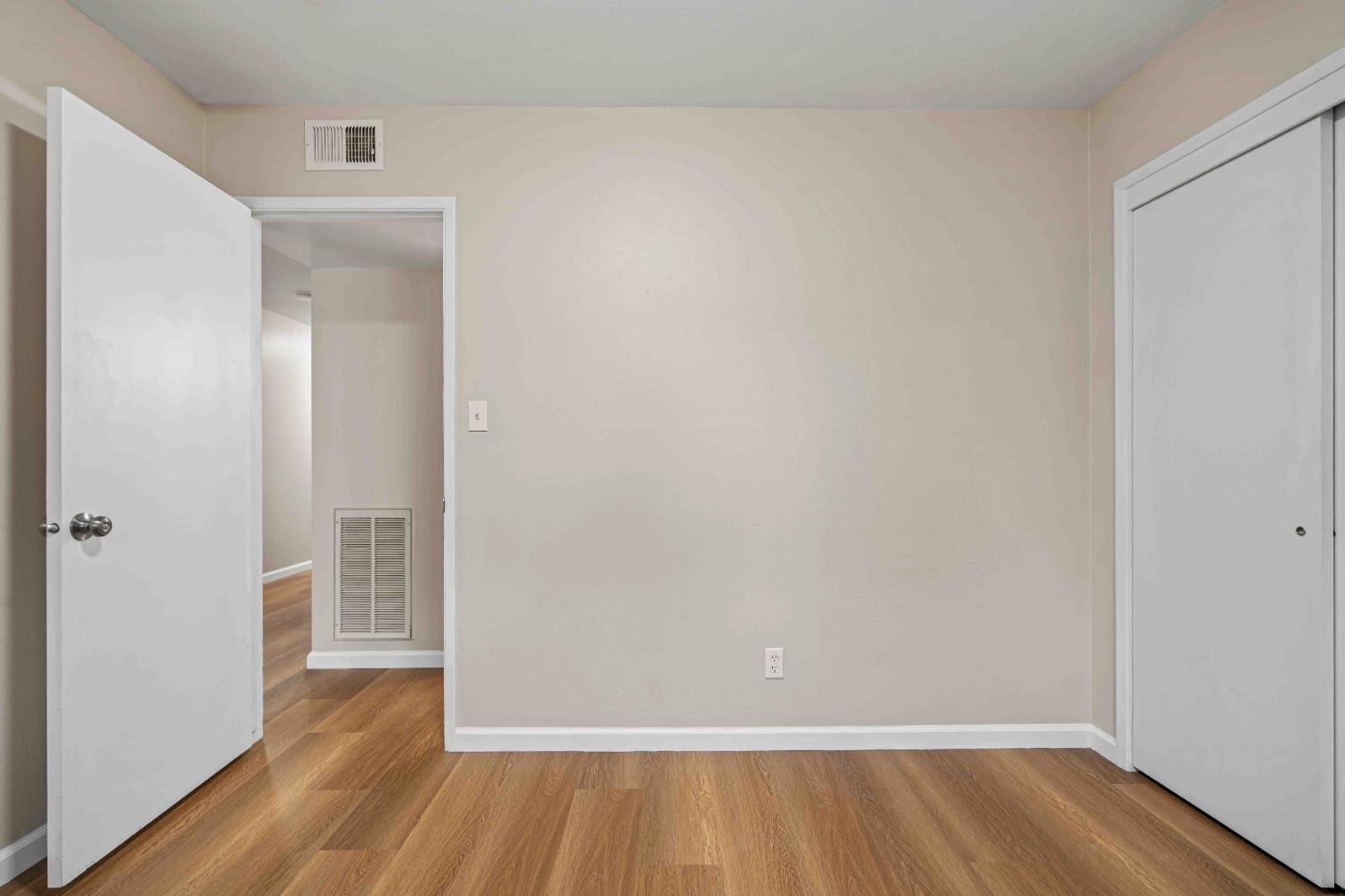 805 Tully Road, Unit 5 Modesto, CA 95350 - Photo 12 of 25 a view of room with wooden floor