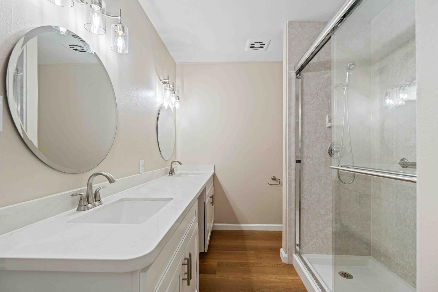805 Tully Road, Unit 5 Modesto, CA 95350 - Photo 13 of 25 a bathroom with a sink and a mirror