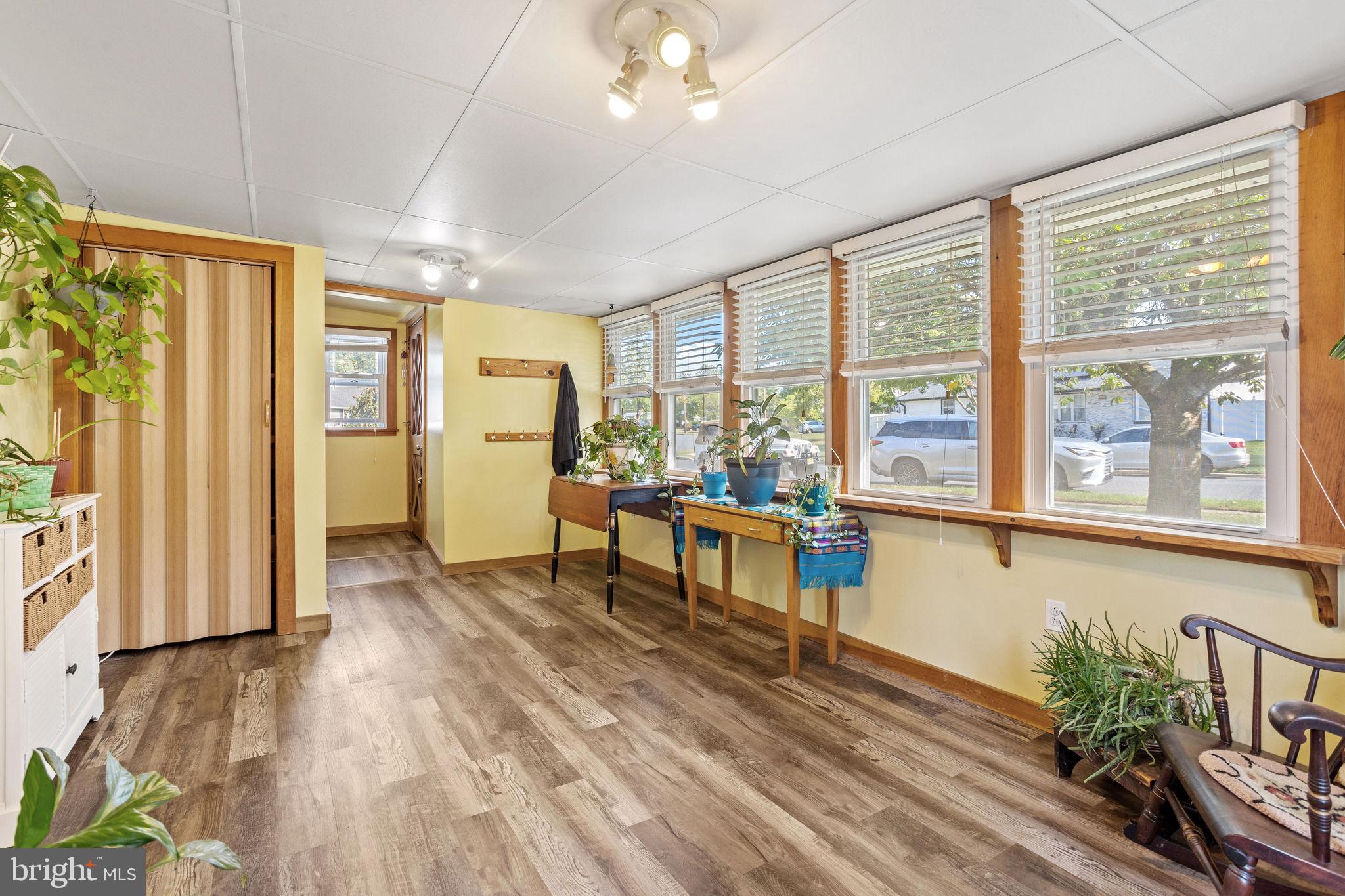 810 Colby Avenue Delran, NJ 08075 - Photo 12 of 33 a living room with furniture and large windows