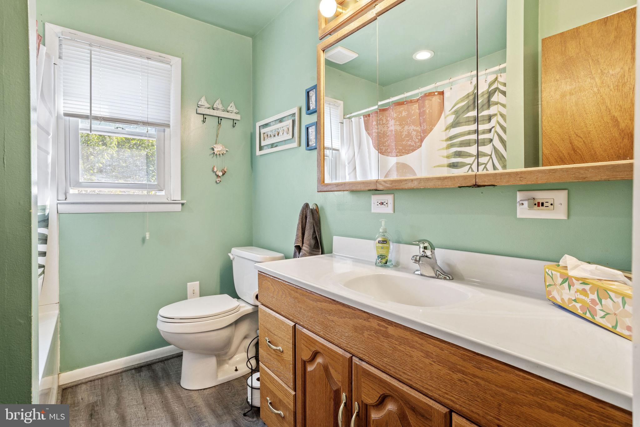 810 Colby Avenue Delran, NJ 08075 - Photo 25 of 33 a bathroom with a sink and a mirror