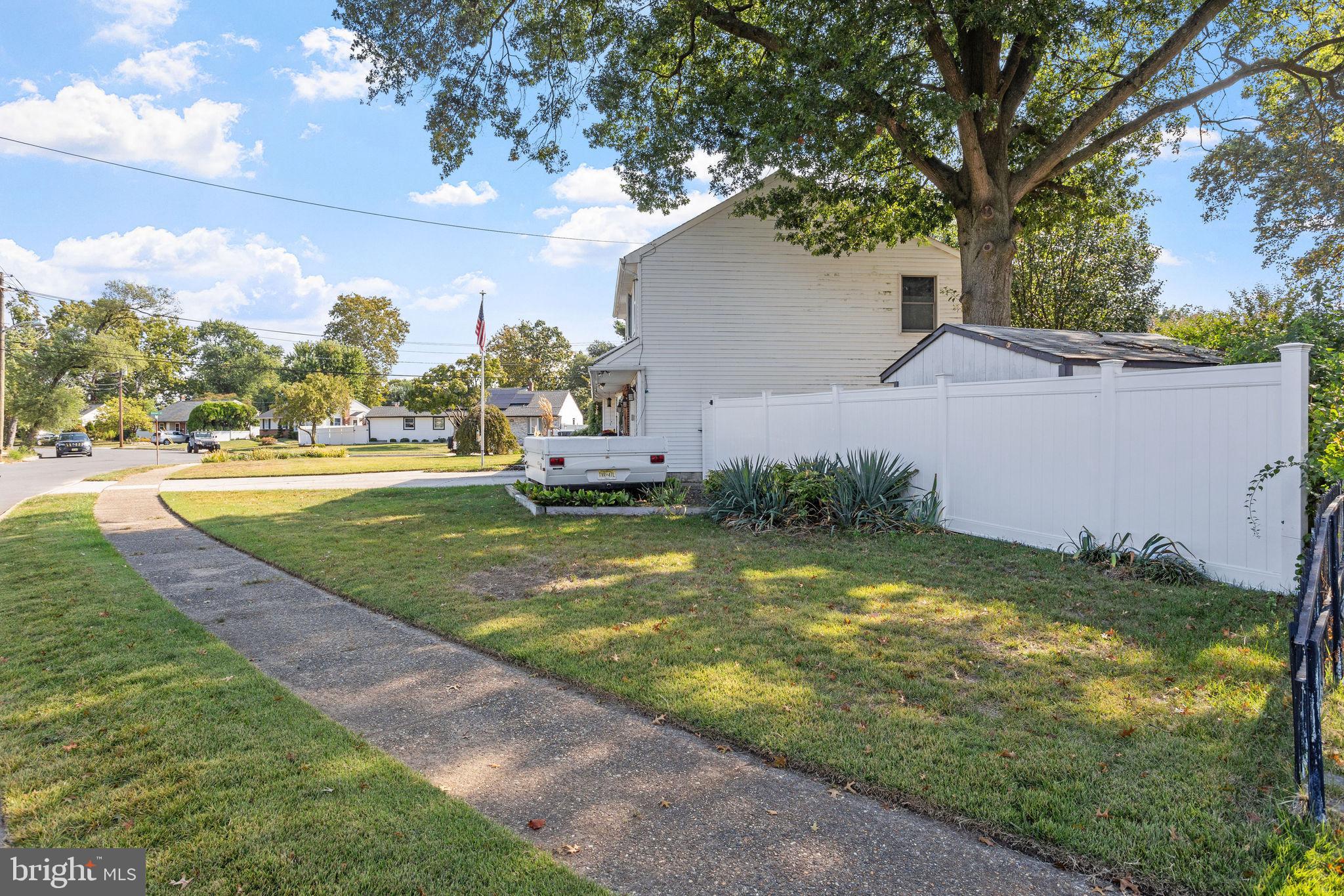 810 Colby Avenue Delran, NJ 08075 - Photo 3 of 33 a view of a backyard with large trees
