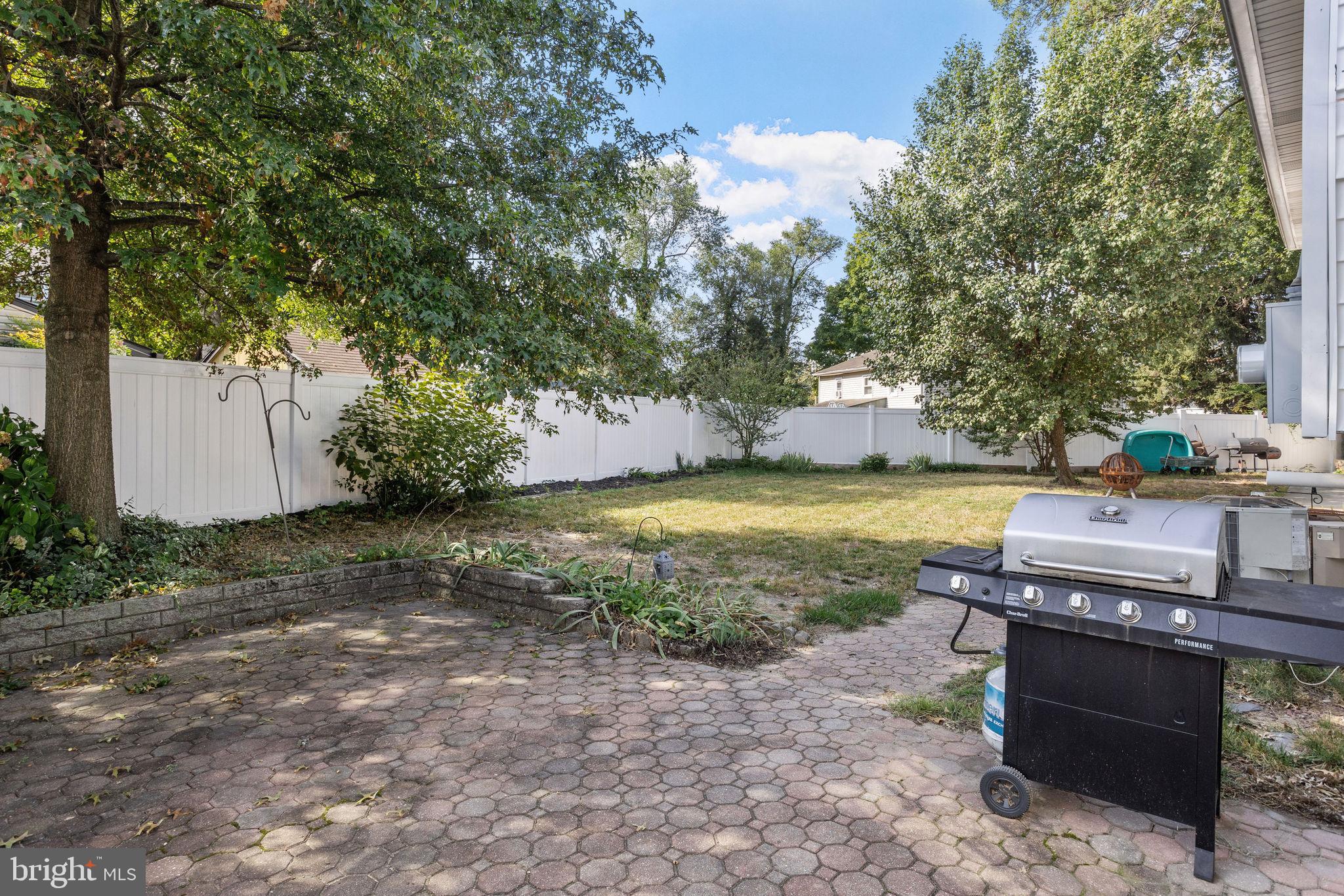810 Colby Avenue Delran, NJ 08075 - Photo 31 of 33 a view of a yard with table and chairs