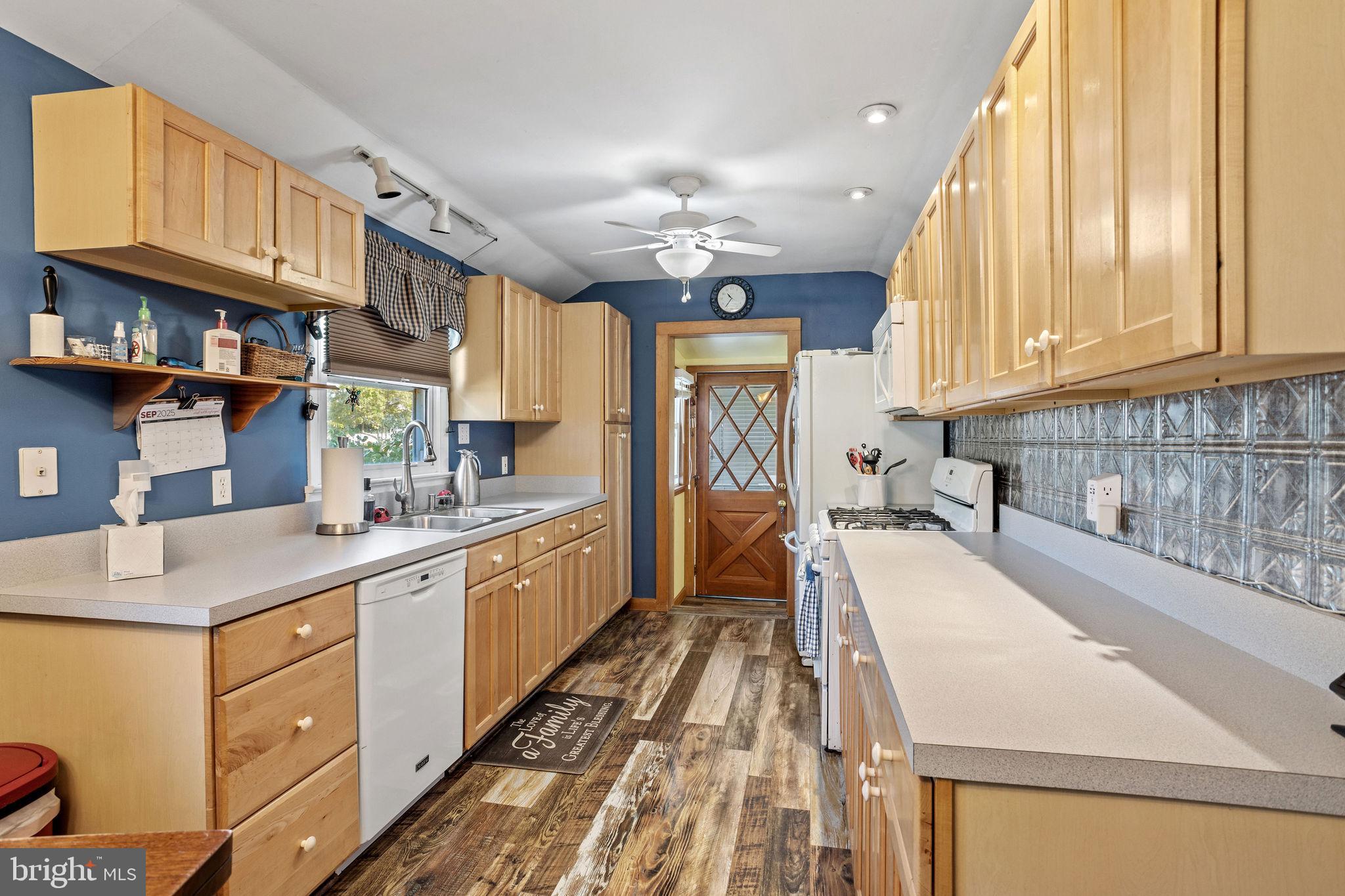 810 Colby Avenue Delran, NJ 08075 - Photo 10 of 33 a kitchen with a sink stove and cabinets