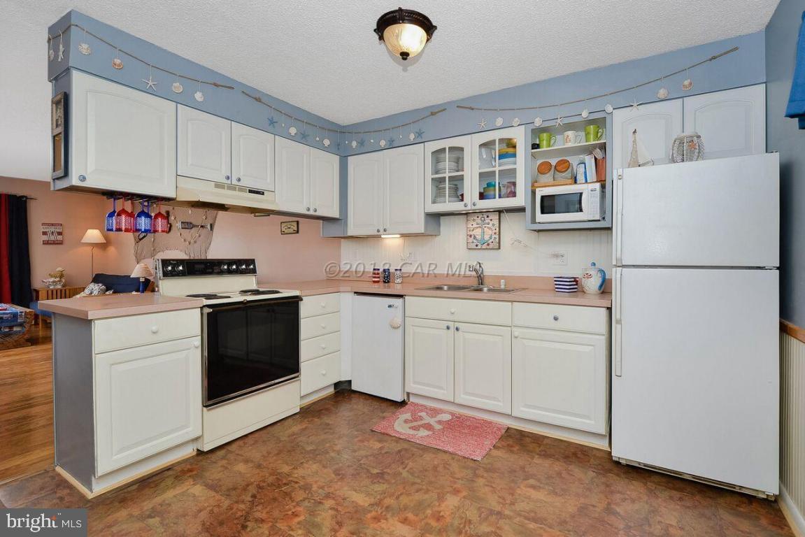 9207 Rusty Anchor Road, Unit A13 Ocean City, MD 21842 - Photo 8 of 19 Gallery Image 8