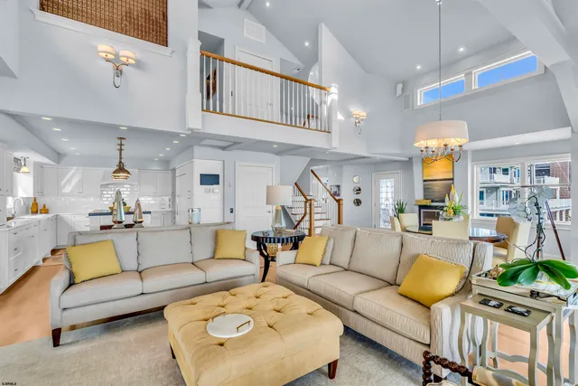 a living room with fireplace furniture and a flat screen tv