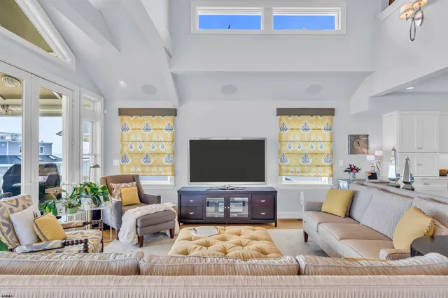 a balcony with furniture and a potted plant