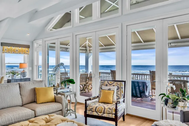 a living room with a furniture and a wooden floor