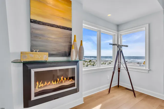 a bedroom with furniture and a flat screen tv